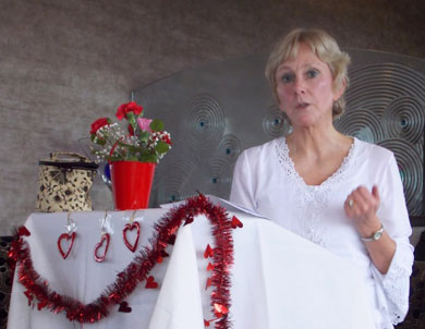 Susan Lyons speaking at Valentine's Day event